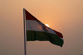 Indian flag, sunset, patriotism, Lucknow, national flag, India, waving flag, majestic, sunset backdrop, tricolor, Ashoka Chakra