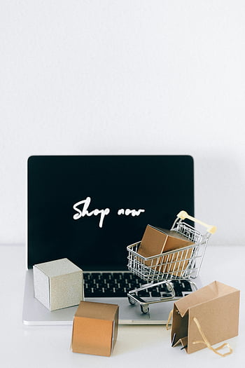 online shopping, laptop, cart, packages, e-commerce, minimalist setup, black and white box, white metal rack, shopping cart, e-commerce setup, digital shopping