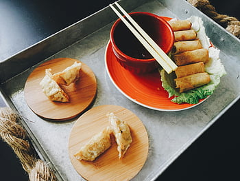 Fried Spring Rolls, dumplings, bamboo plates, chopsticks, soy dipping sauce, Asian food, appetizing, tray, lettuce, wooden plates, dipping sauce