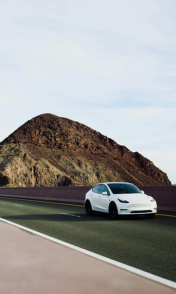 Tesla Model 3, electric car, highway, rocky hills, clear sky, white car, driving, road, landscape, vehicle, outdoors