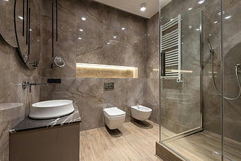 spacious bathroom, shower cabin, shiny tiled walls, marble walls, glass shower, modern fixtures, luxury home, elegant bathroom, contemporary design, bathroom interior, modern bathroom