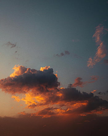 sunset, orange clouds, blue sky, dramatic clouds, serene atmosphere, stunning sunset, orange and blue, red clouds, sky during sunset, sunset sky, dramatic sunset
