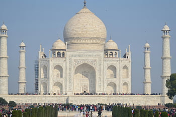 Taj Mahal, Agra, India, clear blue sky, front view, iconic landmark, architectural beauty, grandeur, tourist attraction, white marble, minarets