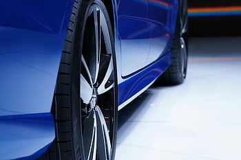 blue vehicle, close-up photo, alloy wheel, blue car, automotive enthusiasts, stylish wheel, car details, vehicle close-up, alloy rim, car wheel, blue alloy
