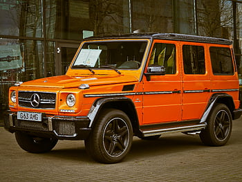 Orange Mercedes Benz G63, bright orange, Mercedes-Benz G Wagon, luxury car, style, parked, building front, G63 AMG, Mercedes-Benz, luxury vehicle, stylish car
