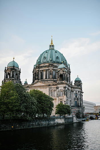 Berlin Cathedral, aged grand cathedral, dome, river shore, scenic view, majestic architecture, dusk, Berlin, cathedral facade, river view, historic building