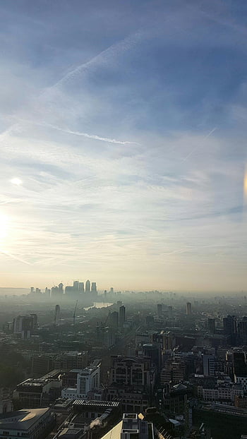 aerial view, city buildings, London skyline, foggy cityscape, iconic skyscrapers, daylight breaking, panoramic view, urban landscape, city panorama, London cityscape, city architecture