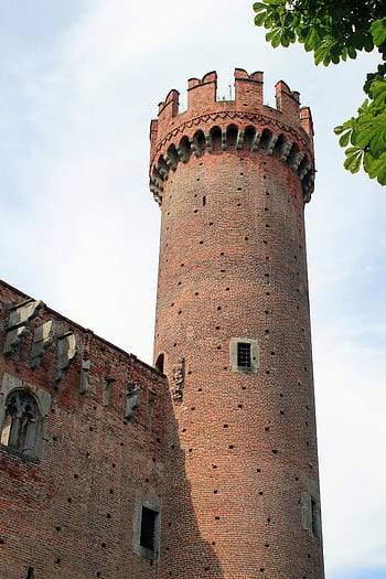 Red Castle Tower, medieval tower, brick architecture, blue sky, historical building, tall tower, architectural history, castle structure, medieval architecture, red bricks, historical landmark