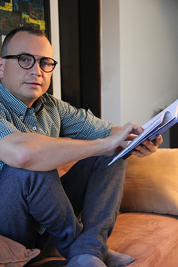man, model, book, notebook, notes, glasses, couch, sitting, writer, poet