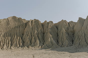 braune Felsformation, blauer Himmel, erodierte Sandstein, Wüstenlandschaft, atemberaubenden Blick, natürliche Formationen, Sandsteinformationen, trostlose Wüste, Landschaftsfotografie, Outdoor-Landschaft, Geologische Merkmale