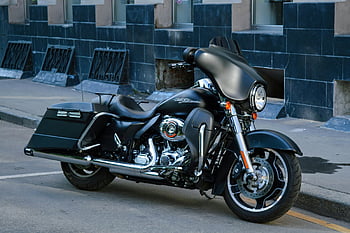 classic motorbike, parked motorcycle, vintage design, black motorcycle, city street, urban setting, classic bike, vintage motorcycle, parked bike, city motorcycle, street parking