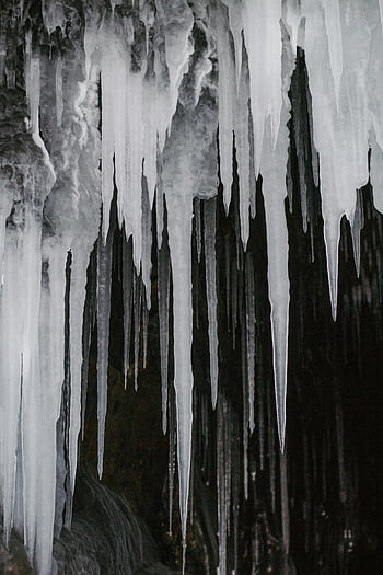 icicles, cave formation, winter cave, sharp icicles, close-up icicles, dark cave, cold cave, icicle formation, cave icicles, winter icicles, cave interior