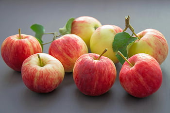 apples, close-up photography, vibrant red apples, yellow apples, freshness, harvest bounty, fruit photography, apple harvest, fresh apples, apple close-up, apple freshness
