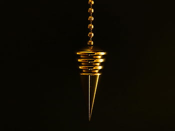 gold pendant, necklace, elegant jewelry, black background, gold chain, luxury accessory, hanging pendant, gold jewelry, elegant necklace, gold accessory, mysterious background