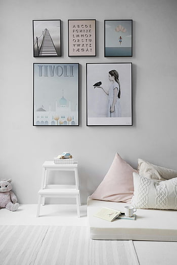 Scandinavian bedroom, wall art, cozy decor, minimalist design, mounted posters, plush pillows, white furniture, soft lighting, modern interior, home decor, Tivoli poster
