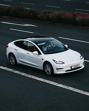 Tesla Model 3, white Tesla, electric vehicle, modern design, driving on highway, Osnabrück Germany, road, car, electric car, modern car, white car