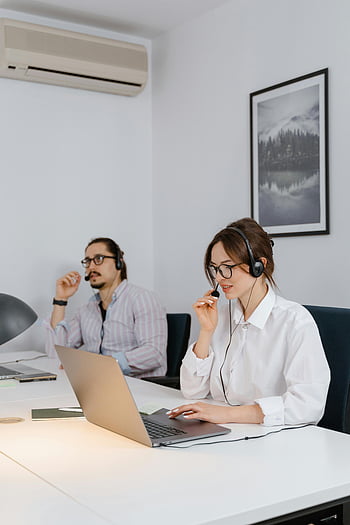 people working, remote work, modern office, professionals, headsets, laptops, office space, remote professionals, modern workspace, working remotely, office environment