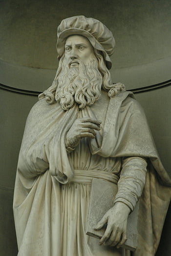 Leonardo Da Vinci, sculpture, marble statue, Renaissance figure, elegant statue, prominent figure, marble art, Renaissance art, historical sculpture, artistic statue, cultural monument