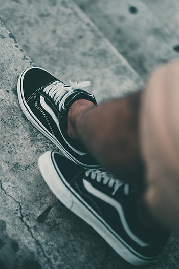 black Vans sneakers, Old Skool, low-tops, concrete stairs, casual style, urban lifestyle, close-up, black shoes, white laces, Vans shoes, streetwear