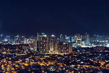 Manila Skyline, vista notturna, città illuminata, architettura moderna, paesaggio urbano, luci della città, fotografia notturna, vista metropolitana, scena notturna, città delle Filippine