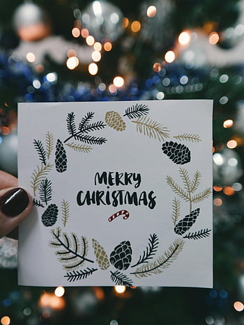 Merry Christmas card, floral Christmas card, beige and black card, decorative tree, bokeh lights, holiday card, Christmas tree, festive card, pine cone design, holiday season, Christmas greetings