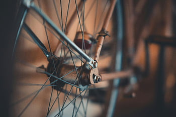 bicycle wheel, selective focus, vintage bicycle, rusty spokes, classic design, close-up photography, detailed shot, bicycle spokes, vintage design, close-up image, selective focus photography