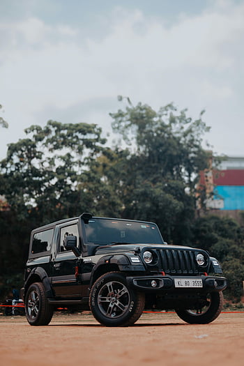 Black Mahindra Thar, suv, fuori strada, parcheggiato all'aperto, capacità robuste, veicolo, ambientazione esterna, macchina nera, SUV Mahindra Thar, fuoristrada, auto parcheggiata