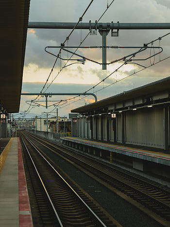 railroad station, platform, city, empty railway station, dusk, Osaka, modern architecture, infrastructure, train tracks, urban transportation, station platform