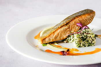 salmon dish, ceramic plate, quinoa, herbs, vibrant sauce, gourmet food, beautifully plated, salmon, quinoa salad, gourmet dish, vibrant presentation