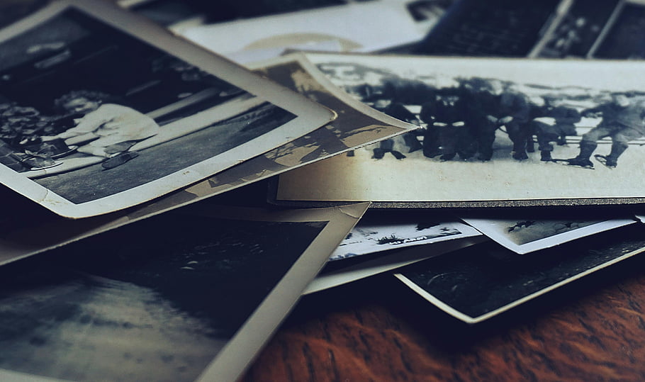 black and white photographs, family memories, classic photos, history, assorted photos, table, vintage photos, black and white images, photo stack, old photographs, family history
