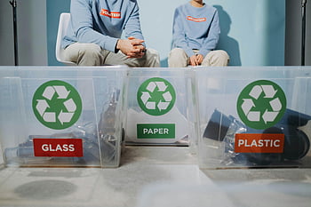 volunteers, recycling, eco-friendly practices, glass bins, paper bins, plastic bins, recyclables, volunteer shirts, plastic containers, labels, chair