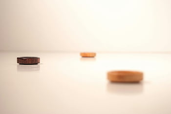 cork lids, white surface, minimalist photo, serene aesthetic, neutral aesthetic, minimalist composition, white background, cork objects, simple design, minimalistic style, clean look