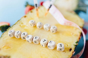 diabetes prevention, letter dices, cut pineapple, insulin syringes, symbolic image, stop diabetes, healthy lifestyle, fruit, medical awareness, diabetes awareness, health education