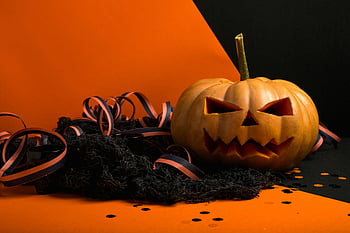 kurpitsalyhty, halloween sisustus, veistetty kurpitsa, aavemainen, musta ja oranssi nauha, halloween koriste, juhlava, syksy, kausiluonteinen, oranssi tausta, musta tausta