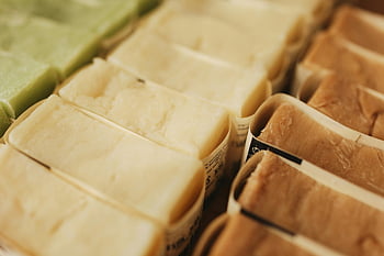 handmade natural bar soaps, eco-friendly beauty products, skincare, organized display, variety of soaps, natural soaps, bar soaps, eco-friendly, beauty products, skincare products, natural skincare