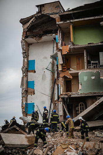 rescuers, destroyed building, collapsed building, disaster response, Borodyanka, emergency services, rescue operation, rubble, rescue workers, disaster relief, building collapse