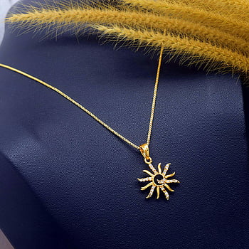 Golden Sun Necklace, crystals, gold necklace, sun-shaped pendant, elegant display, close-up jewelry, fashion accessories, luxury jewelry, gold chain, crystal jewelry, sun pendant