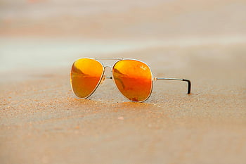 Rayban sunglasses, aviator sunglasses, orange reflection, sand, summer vibe, close-up, beach, warm, outdoor, fashion, accessories