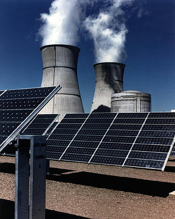 black solar panels, renewable energy, cooling towers, power plant, sustainable energy, solar farm, industrial landscape, clean energy, environmental technology, energy production