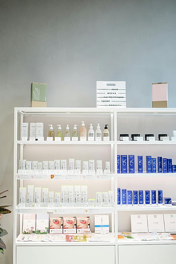 beauty products, skincare products, store shelves, organized display, cosmetic products, skincare display, beauty store, product shelves, skincare items, store setting, beauty items