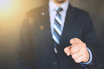 businessman, suit jacket, pointing forward, leadership, focus, confident, close up, professional, formal attire, business suit, tie
