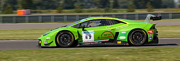 green sports car, gray asphalt road, high-speed racing, circuit track, daytime racing, green racing car, sports car racing, racing circuit, daytime sports car, green car racing, asphalt road racing