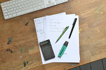 calculator, pens, marker, papers, office desk, paperwork, keyboard, stationery supplies, work organization, overhead view, desk setup