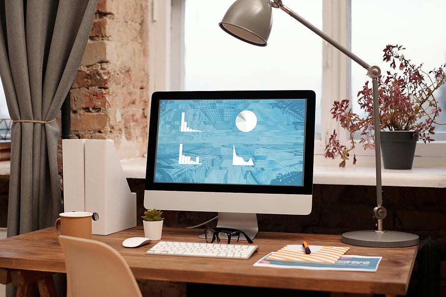 home office, clean workspace, modern setup, computer desk, productivity environment, contemporary workspace, desk lamp, indoor decor, minimalist design, wooden desk, brick wall background