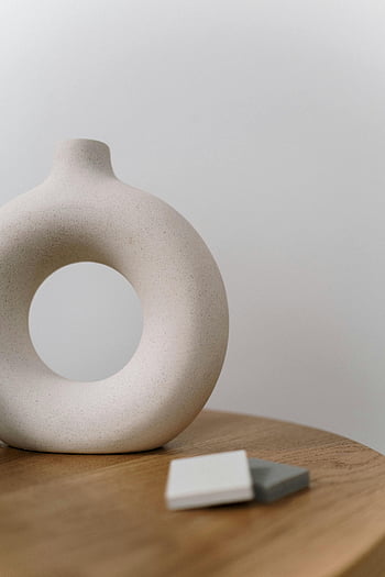 ceramic vase, decorative vase, minimalistic design, wooden table, elegant vase, modern decor, home decor, interior design, ceramic art, minimalist art, table decor