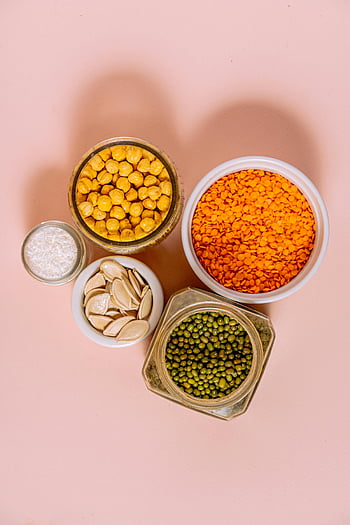 chickpeas, beans, lentil seeds, raw seeds, legumes, healthy cooking, pink background, variety of seeds, containers with seeds, healthy ingredients, cooking ideas