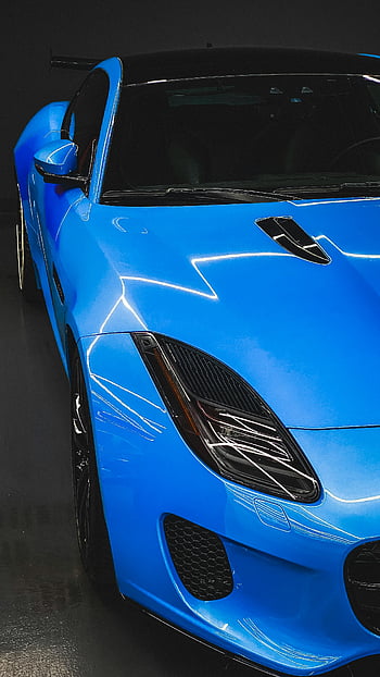 blue sports car, Dubai showroom, sleek design, blue car, white black license plate, modern showroom, elegant car design, car showcase, blue vehicle, sports car design, car exhibition