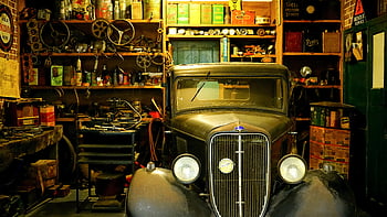 black classic car, vintage car, garage, classic tools, workshop setting, classic equipment, vintage automobile, garage interior, classic car restoration, automotive workshop, retro car