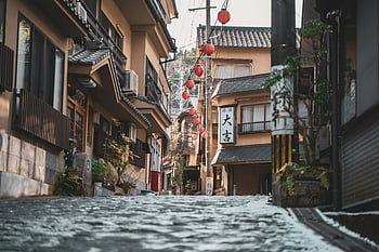 Osaka street photography, traditional architecture, red lanterns, picturesque street, Japanese street, Osaka Japan, urban landscape, street scene, cultural heritage, cityscape, traditional buildings