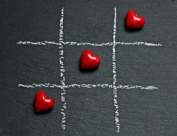tic tac toe, red hearts, love connection, game illustration, black surface, chalk board, heart shapes, romantic game, connection symbol, red and white, love game